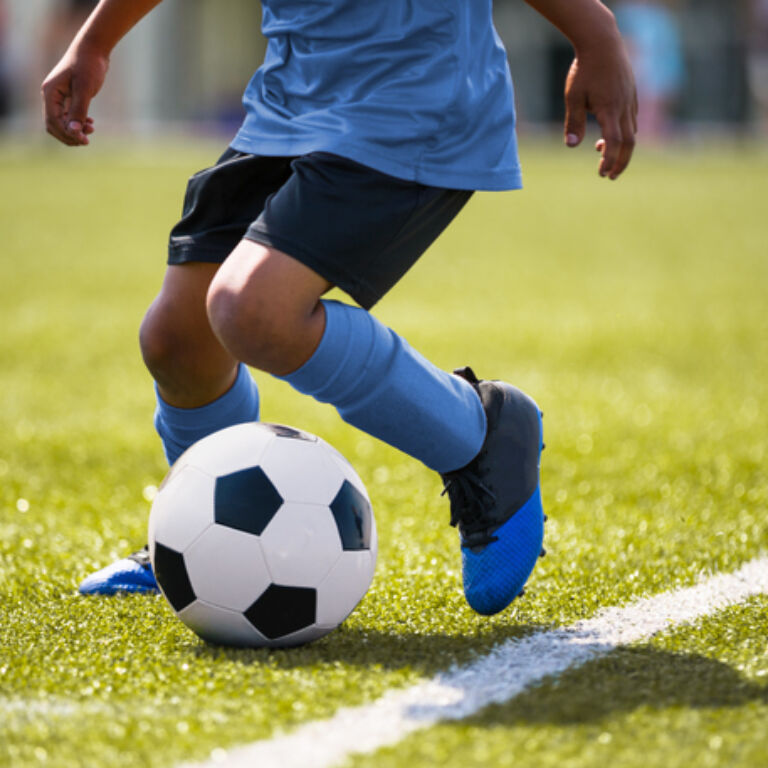kid playing soccer